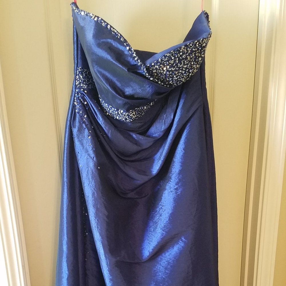 Strapless, formal blue gown. Floor length
